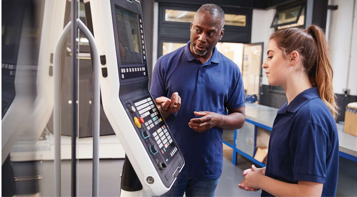 people looking at machine