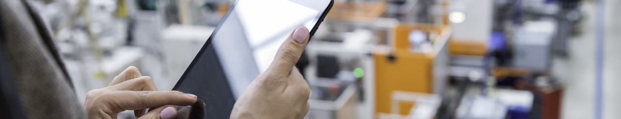 person holding tablet