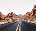 road going between mountains