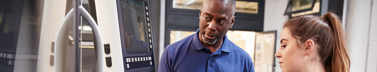 people looking at computer