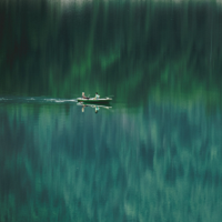 people in boat on water