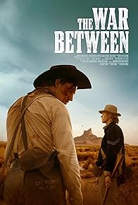 The war between poster. Two cowboys standing in desert.
